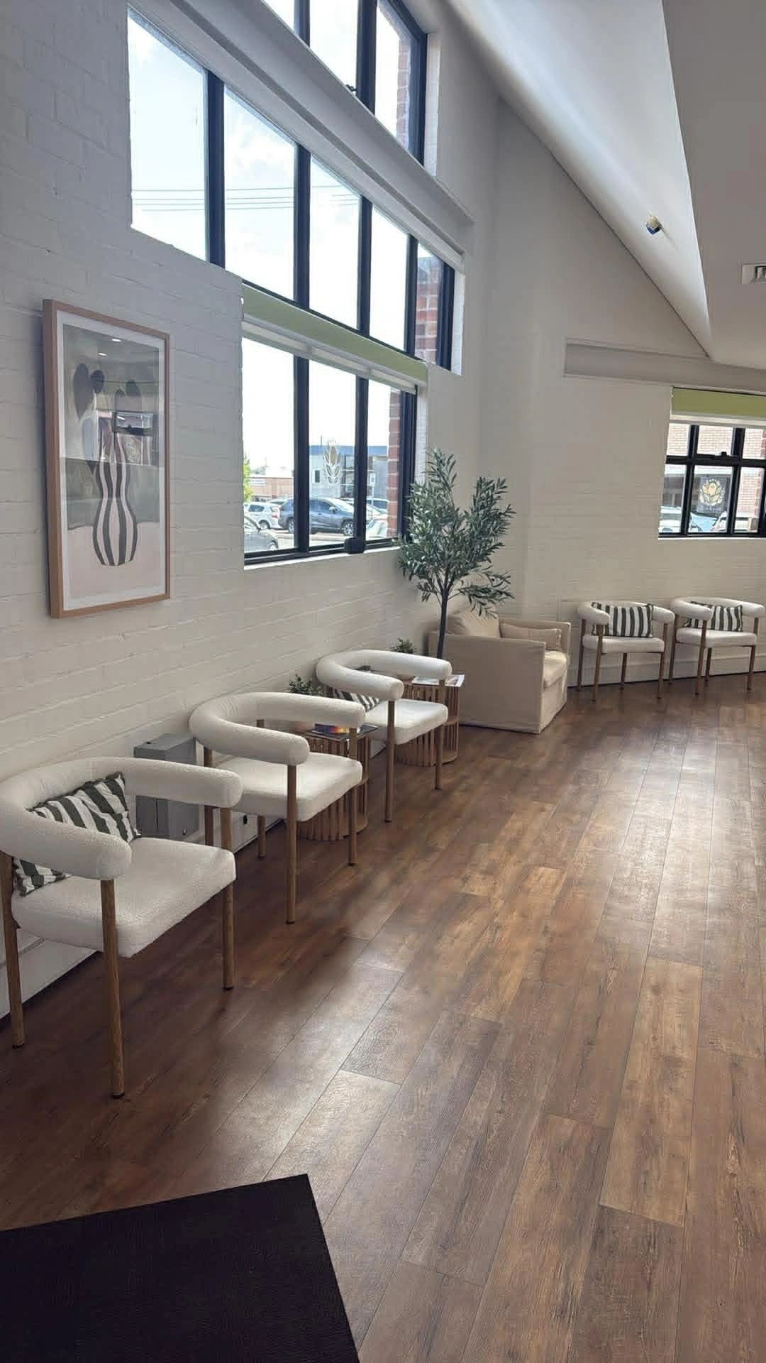 Comfortable consulting room with neutral tones and natural light